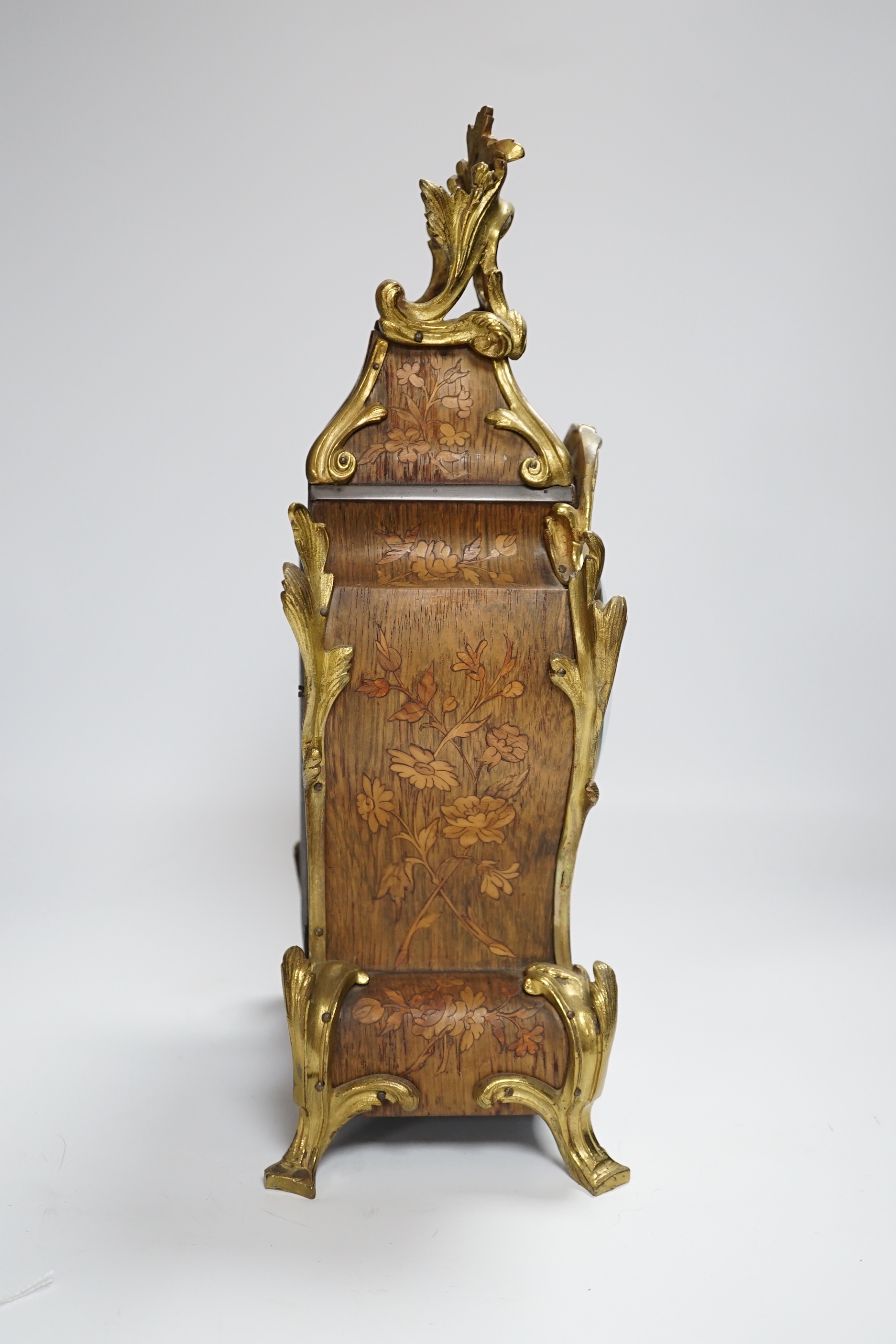 A French gilt metal mounted rosewood mantel clock. 40cm